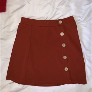 Mini skirt with buttons